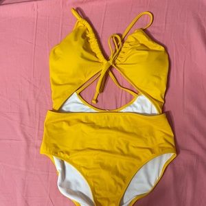 VS Pink yellow one piece size medium